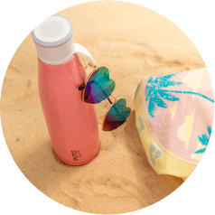 beach PURE drinkware speaker bottle REMEDY brand photography in Atlanta
